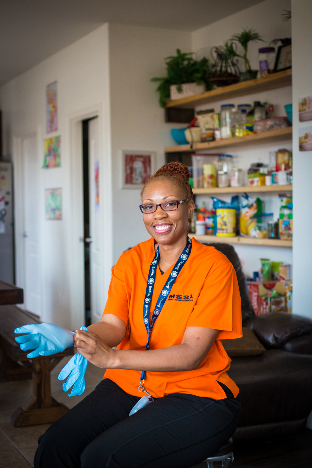 Nurse preparing to perform a skin cancer screening in phoenix az for dermatology appointment at home